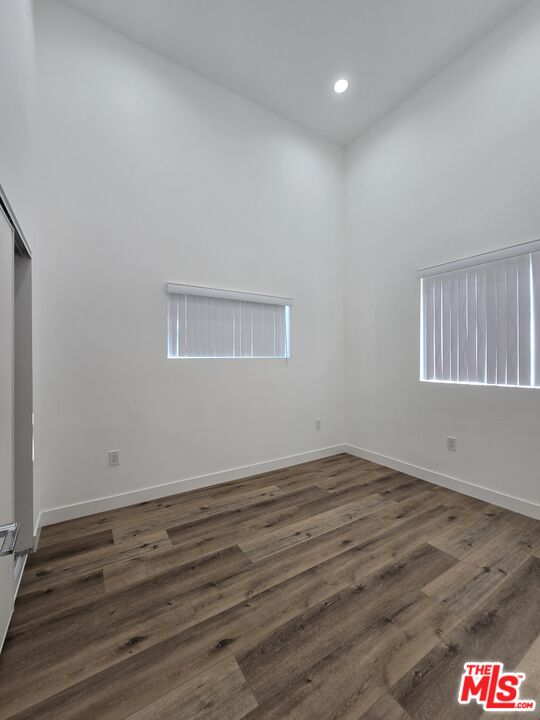 449 West 74th Street Los Angeles, CA 90003 - Photo 17 of 28 wooden floor in an empty room