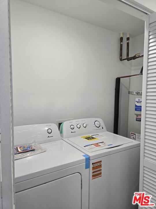449 West 74th Street Los Angeles, CA 90003 - Photo 19 of 28 a utility room with dryer and washer