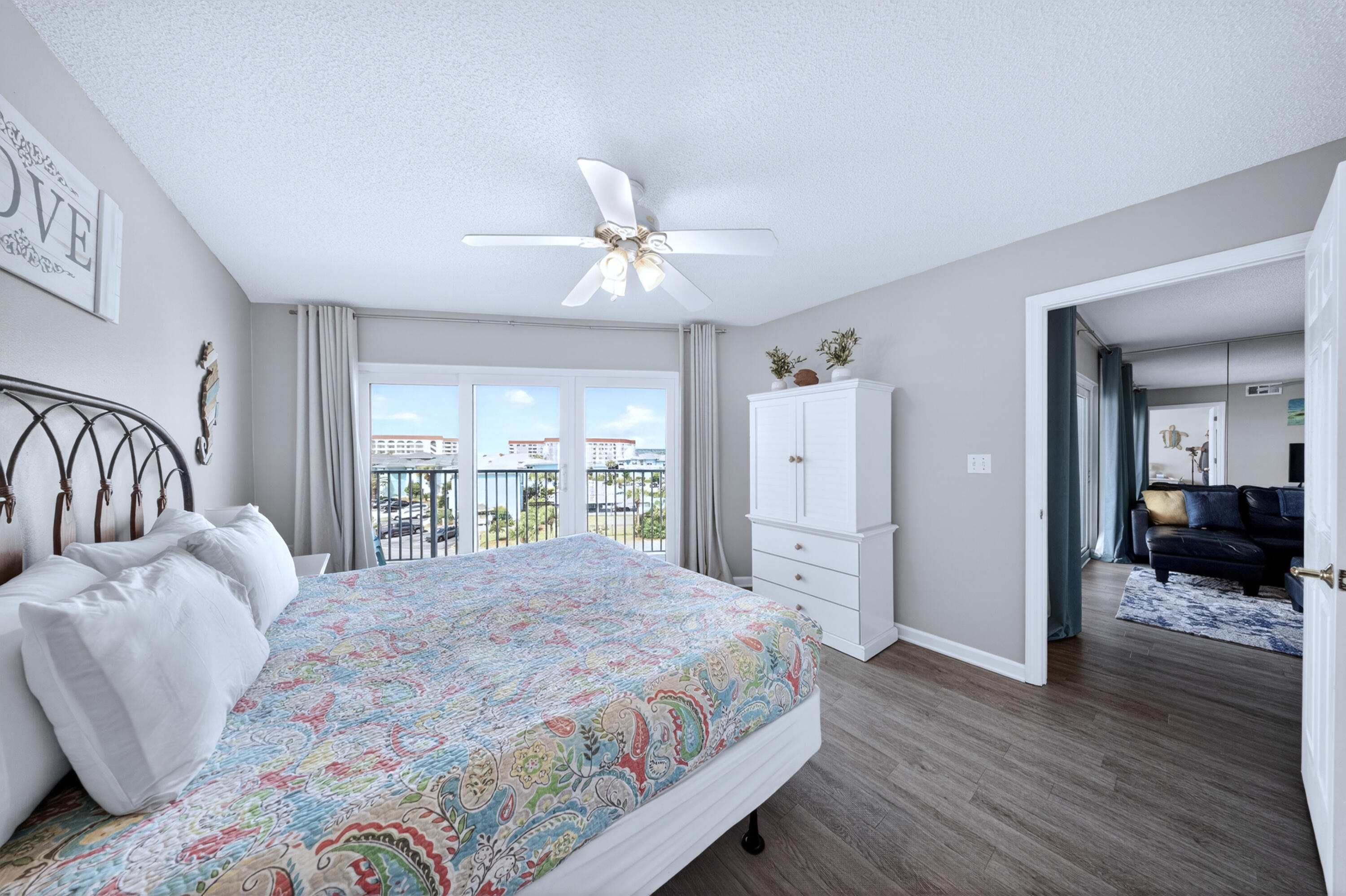 895 Santa Rosa Boulevard, Unit 510 Fort Walton Beach, FL 32548 - Photo 20 of 45 a spacious bedroom with a bed and a walk in closet
