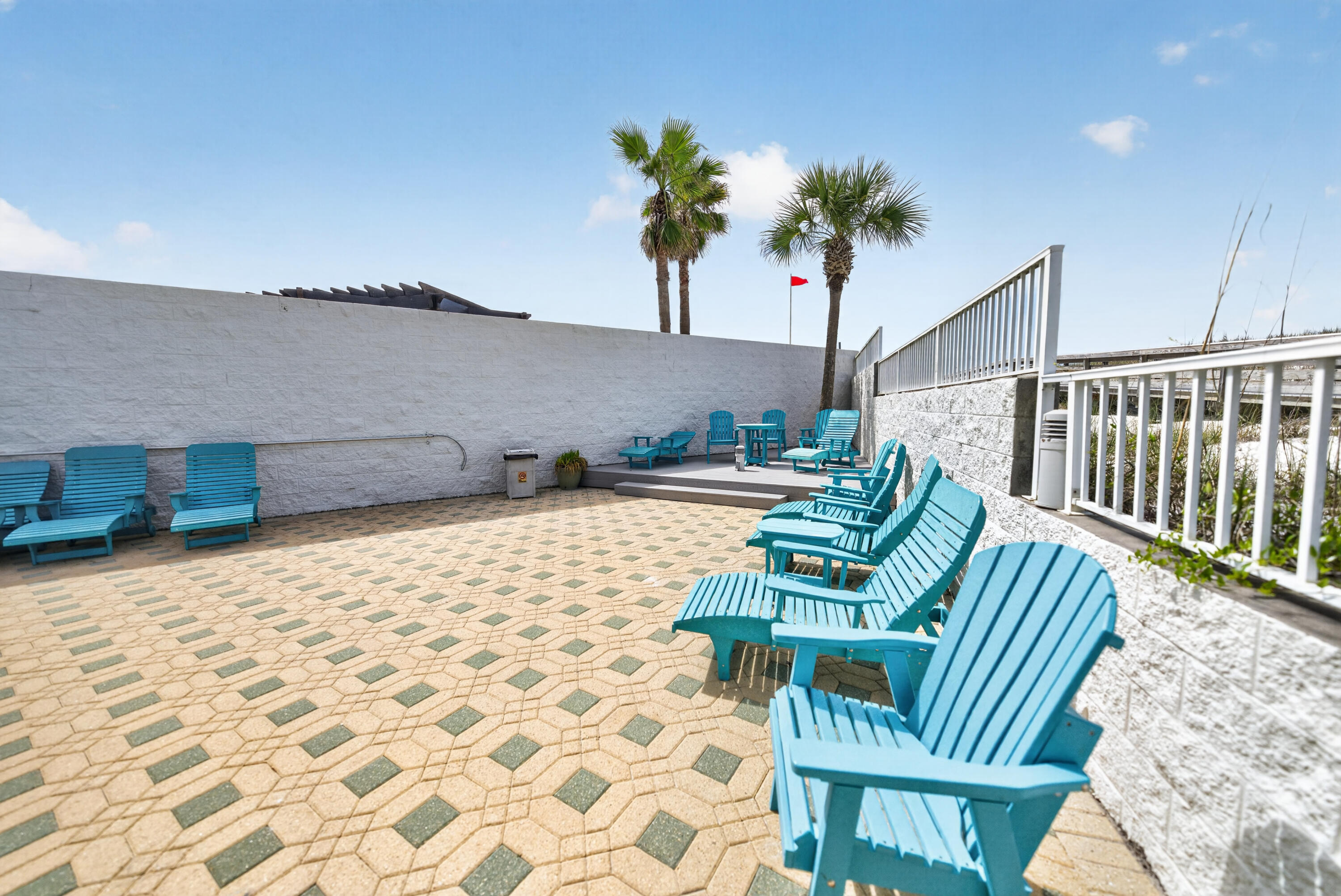 895 Santa Rosa Boulevard, Unit 510 Fort Walton Beach, FL 32548 - Photo 31 of 45 a view of an chairs and potted plant