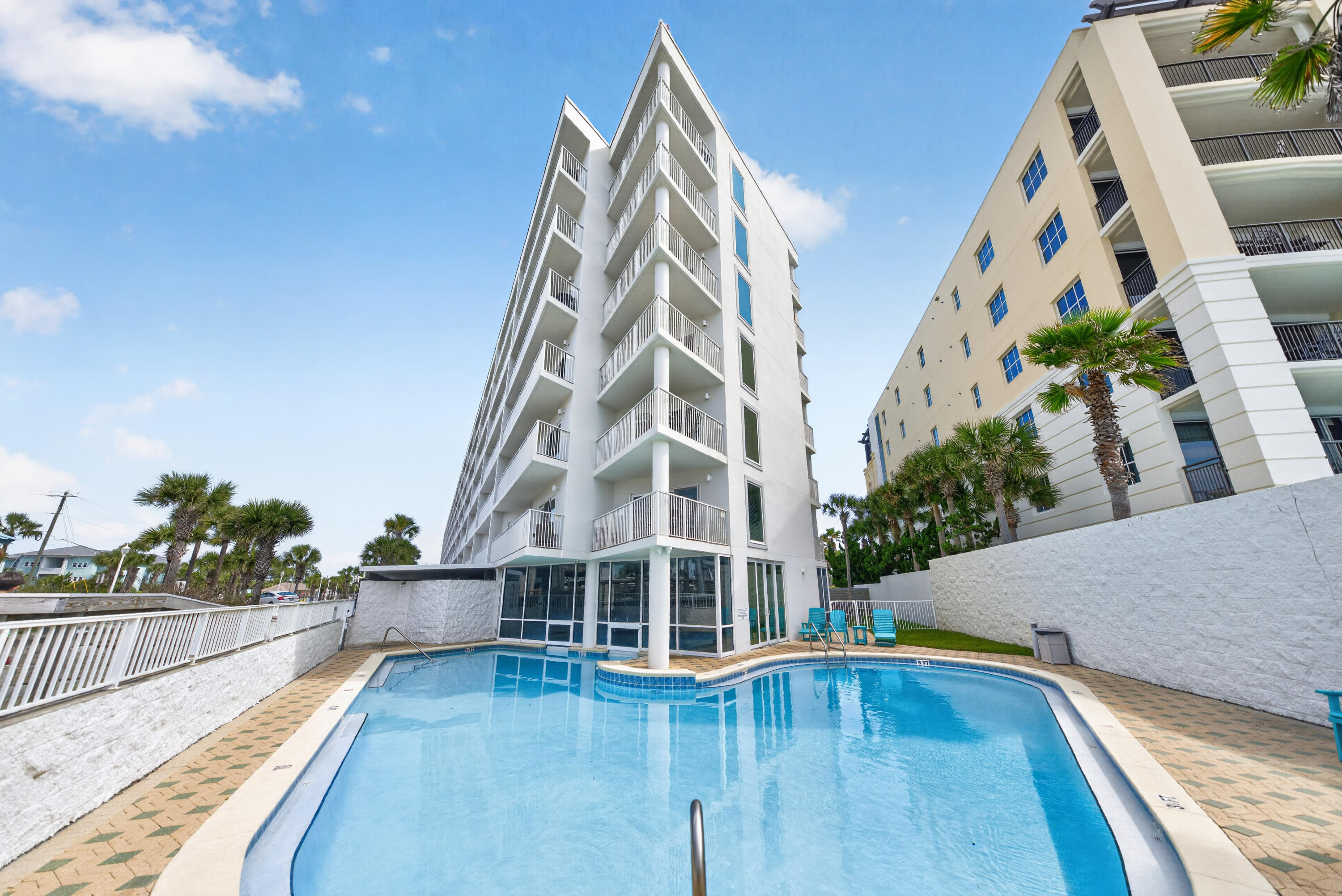 895 Santa Rosa Boulevard, Unit 510 Fort Walton Beach, FL 32548 - Photo 5 of 45 a view of balcony with two potted plants