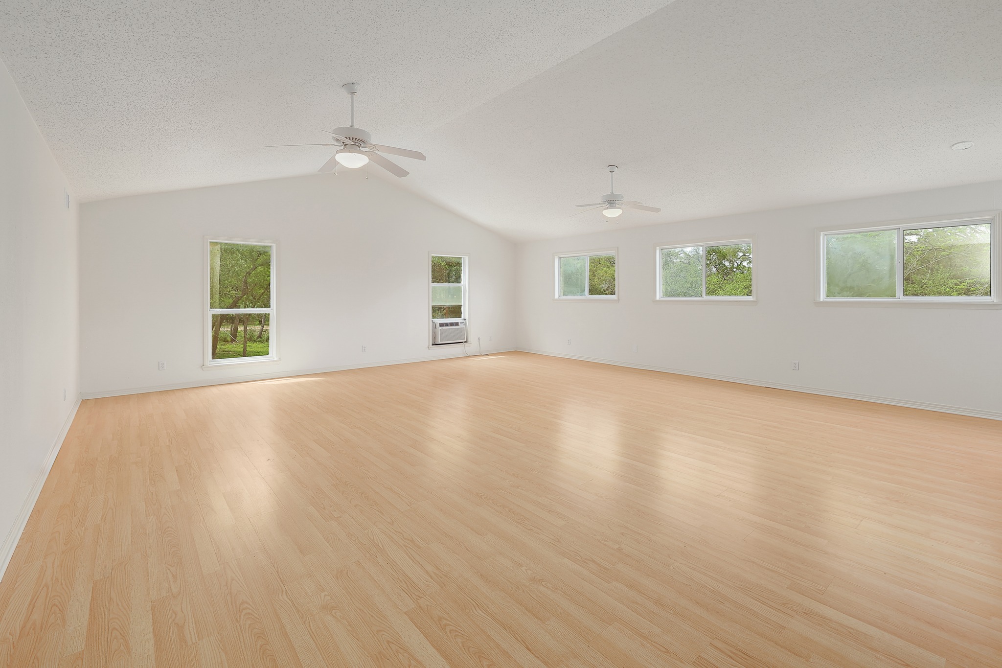 1700 Patterson Road Austin, TX 78733 - Photo 23 of 36 Huge Bonus Room over the garage with lots of natural light