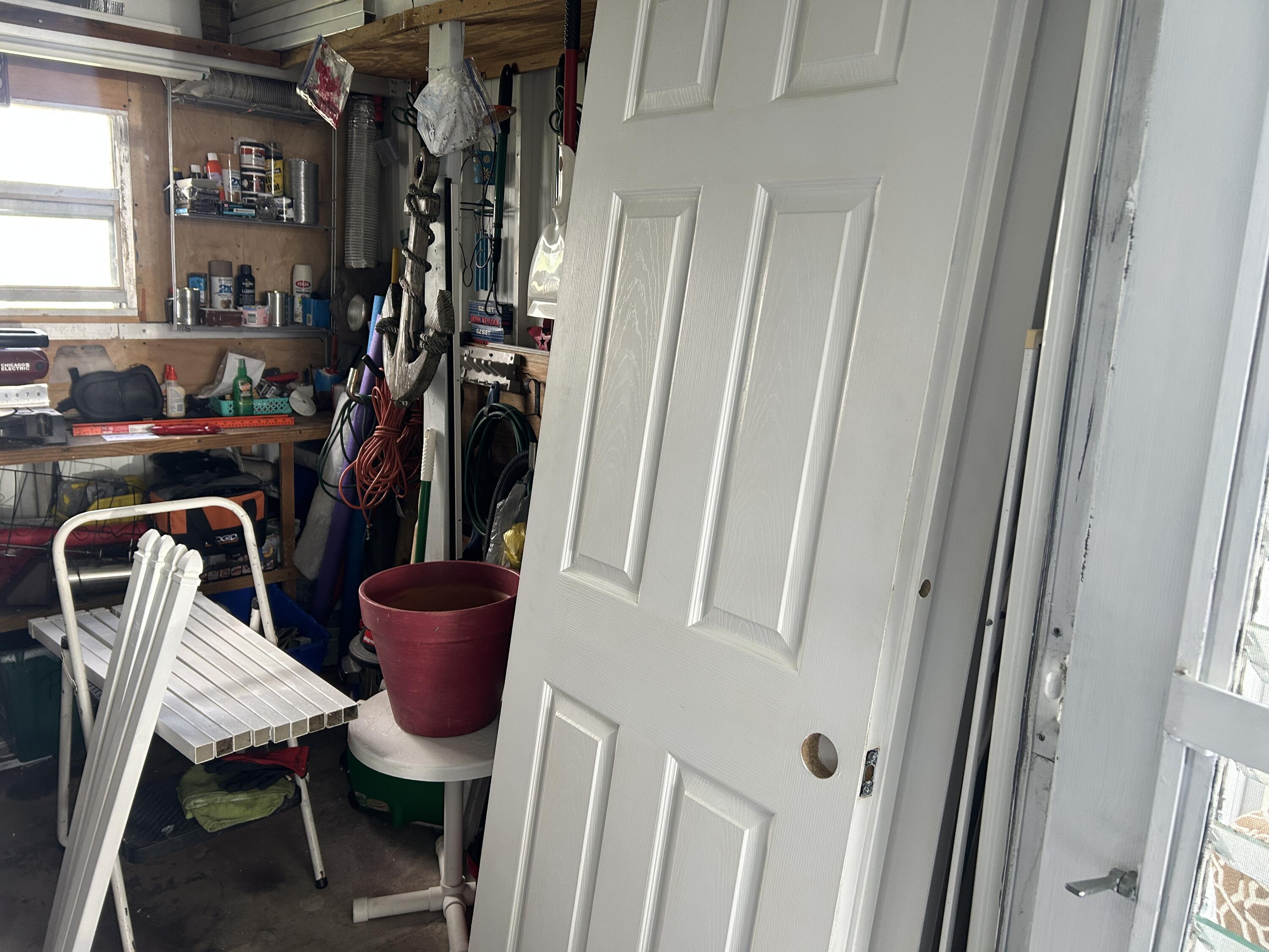 63 Ipanema Way Fort Pierce, FL 34951 - Photo 23 of 49 a view of a dining room with furniture window and wooden floor