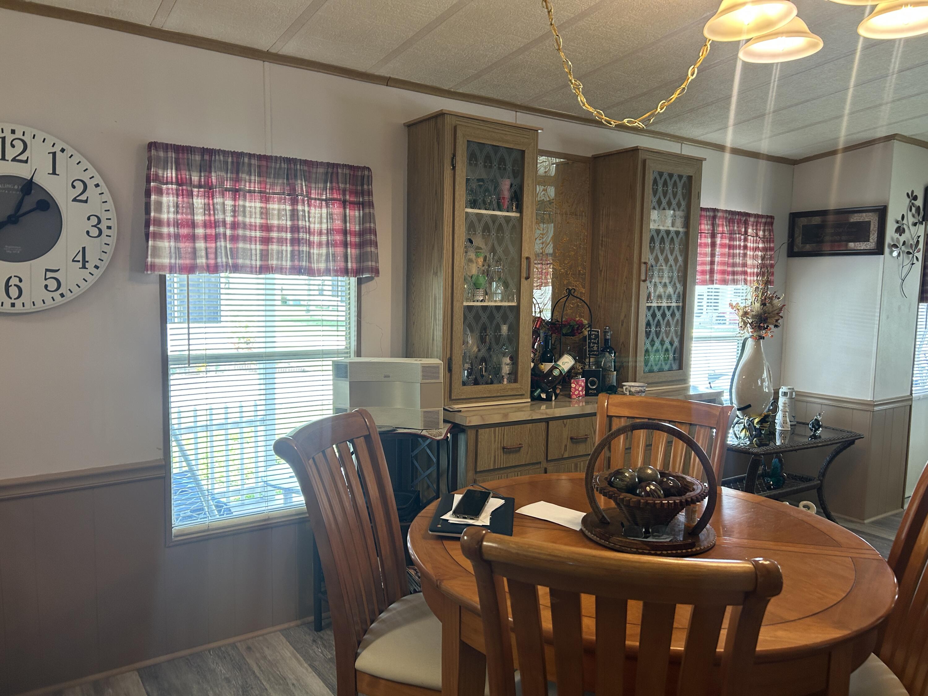 63 Ipanema Way Fort Pierce, FL 34951 - Photo 28 of 49 a dining room with furniture and window