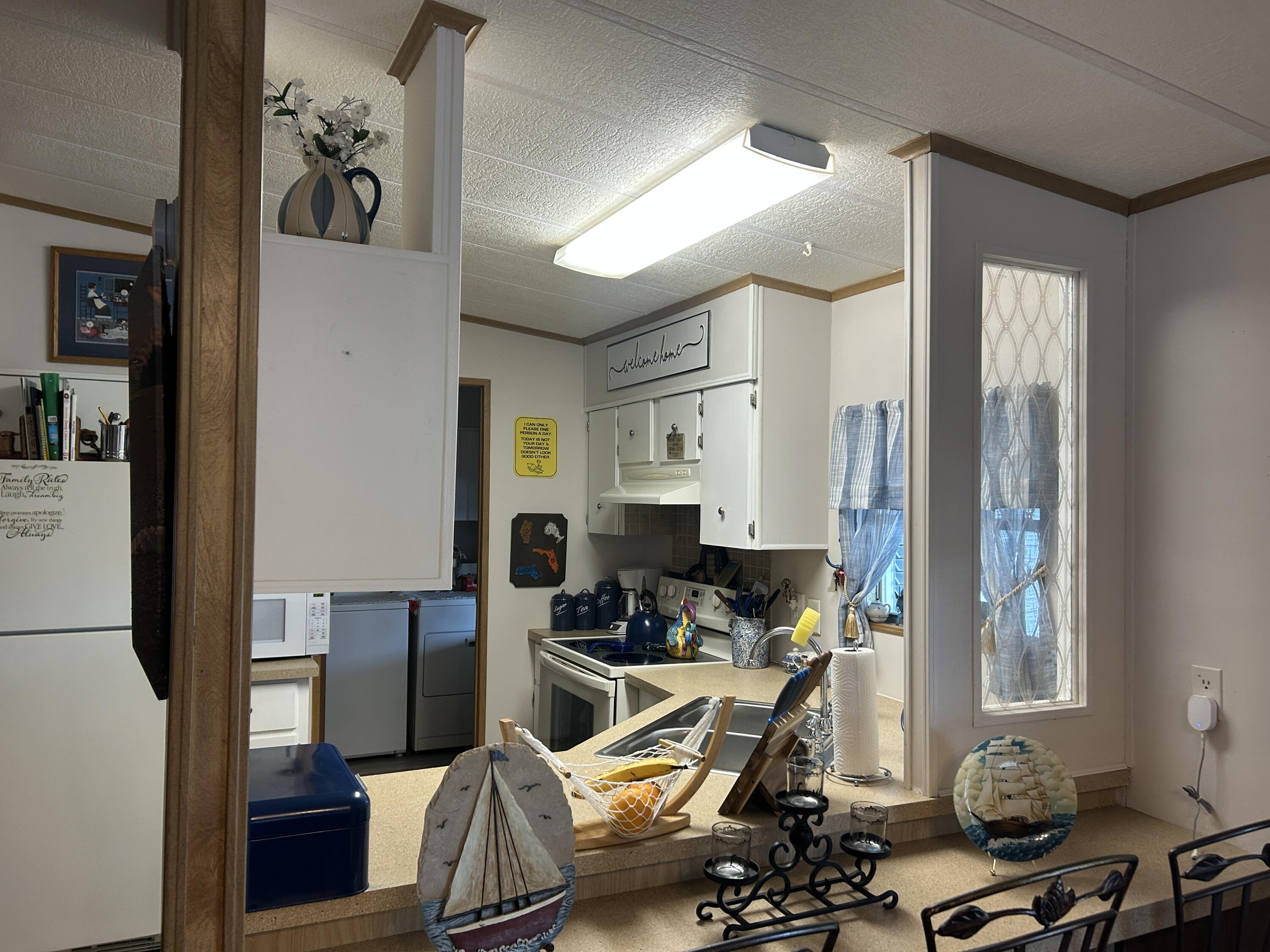 63 Ipanema Way Fort Pierce, FL 34951 - Photo 29 of 49 a view of a room with gym equipment