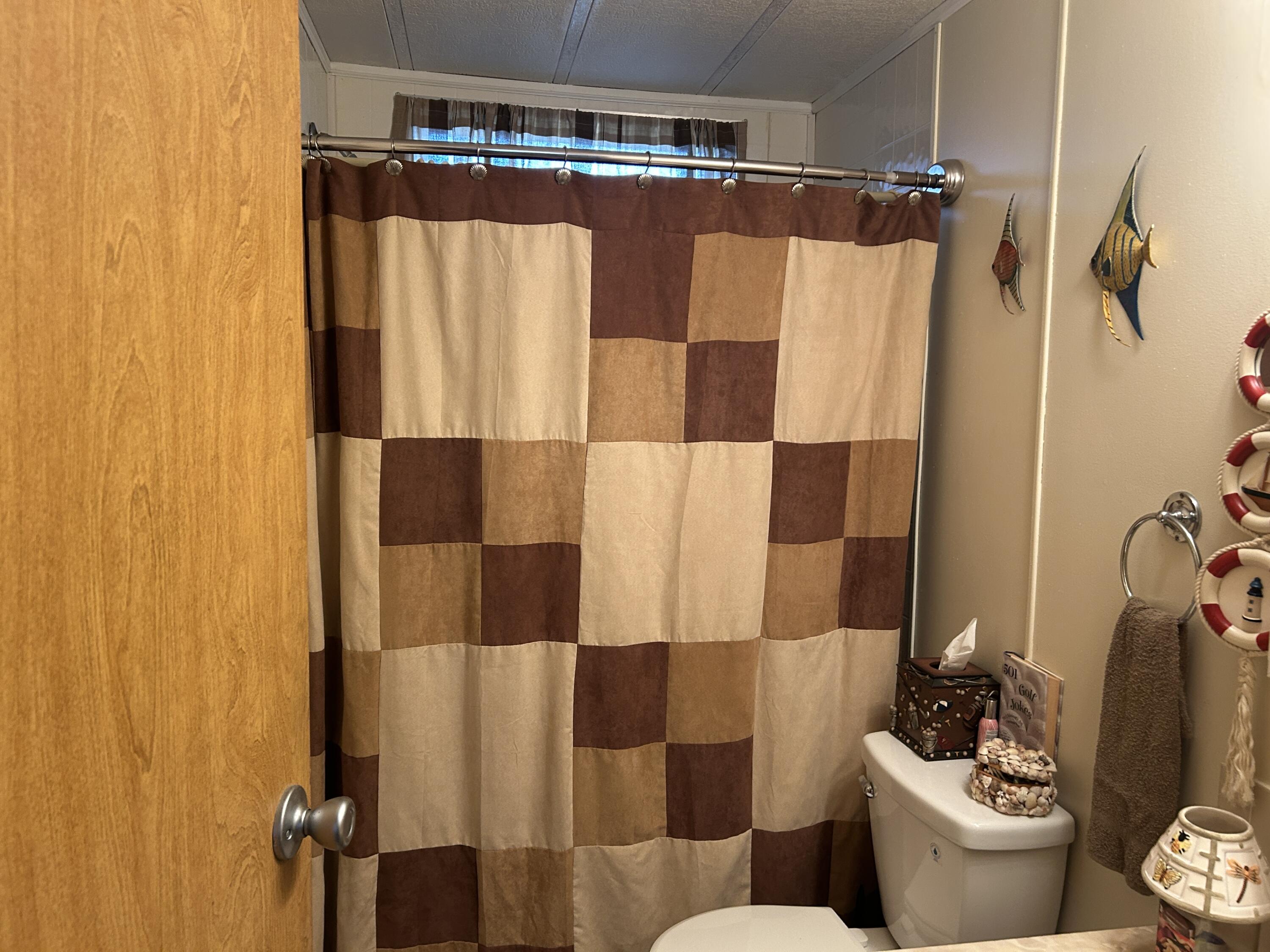 63 Ipanema Way Fort Pierce, FL 34951 - Photo 32 of 49 a bathroom with a bathtub and shower