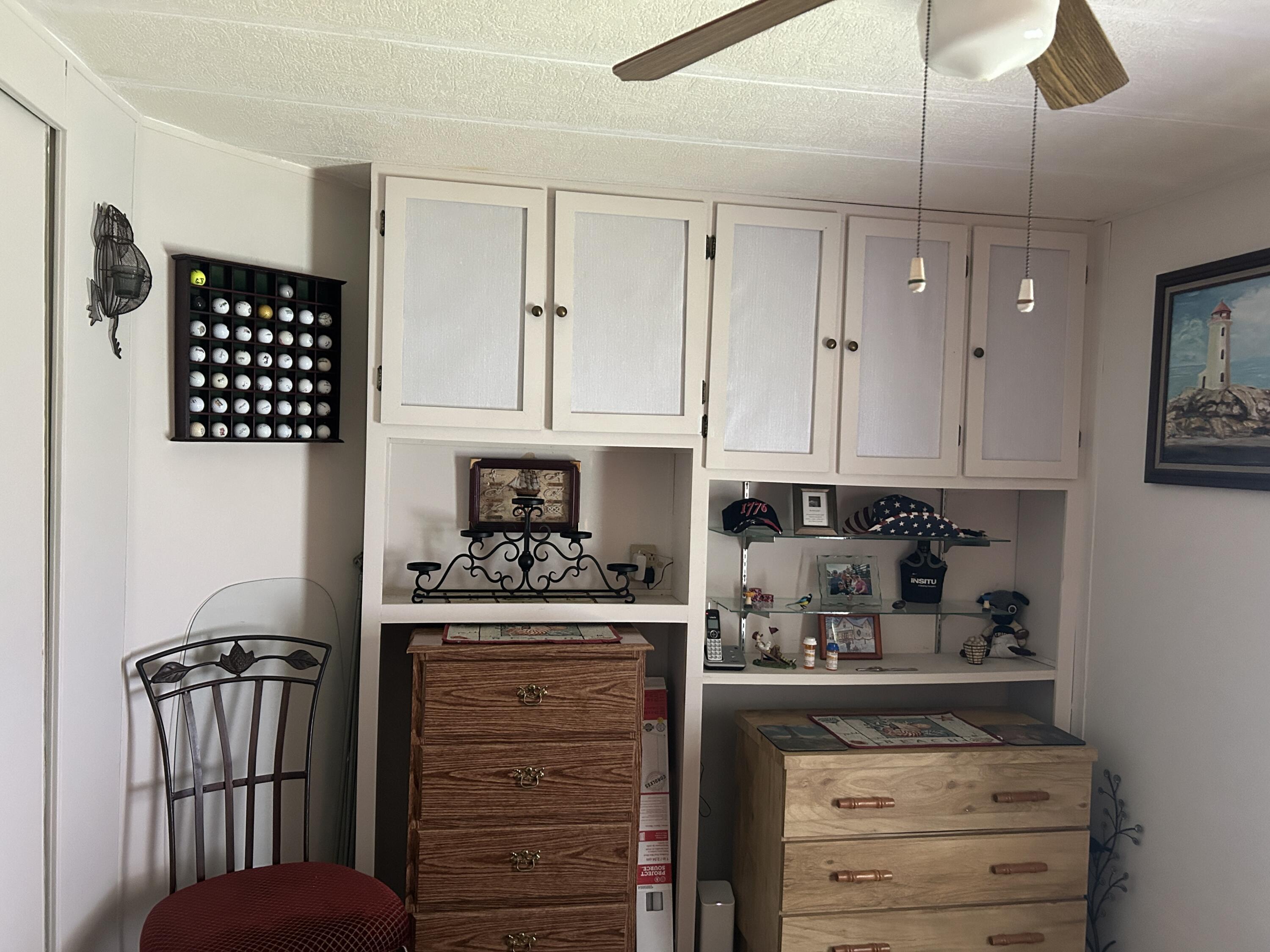 63 Ipanema Way Fort Pierce, FL 34951 - Photo 39 of 49 a kitchen with appliances cabinets and a counter top space