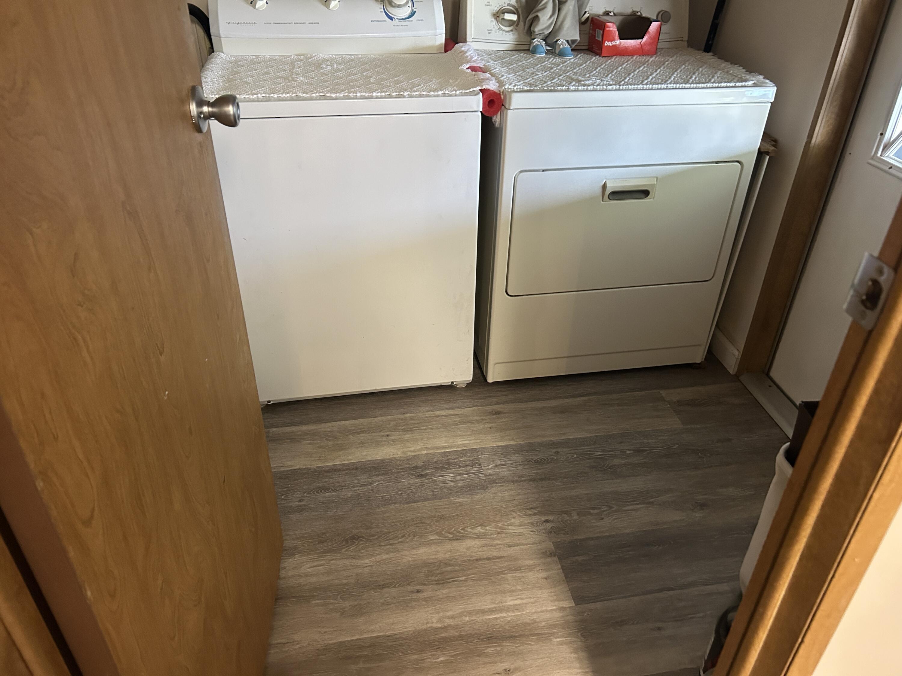 63 Ipanema Way Fort Pierce, FL 34951 - Photo 47 of 49 a utility room with dryer and washer