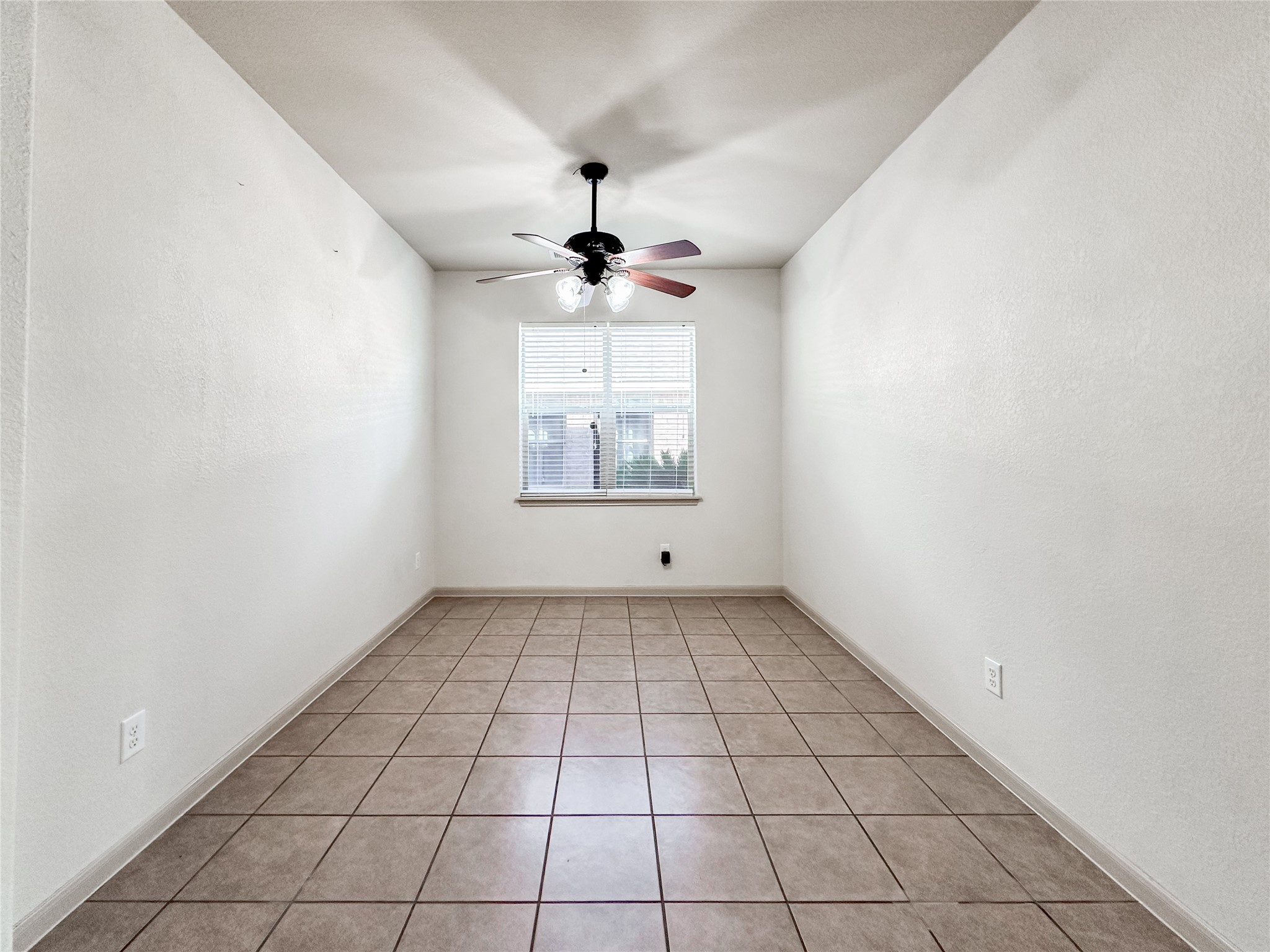 20319 Little Wing Drive Spring, TX 77388 - Photo 11 of 49 a view of an empty room with a window