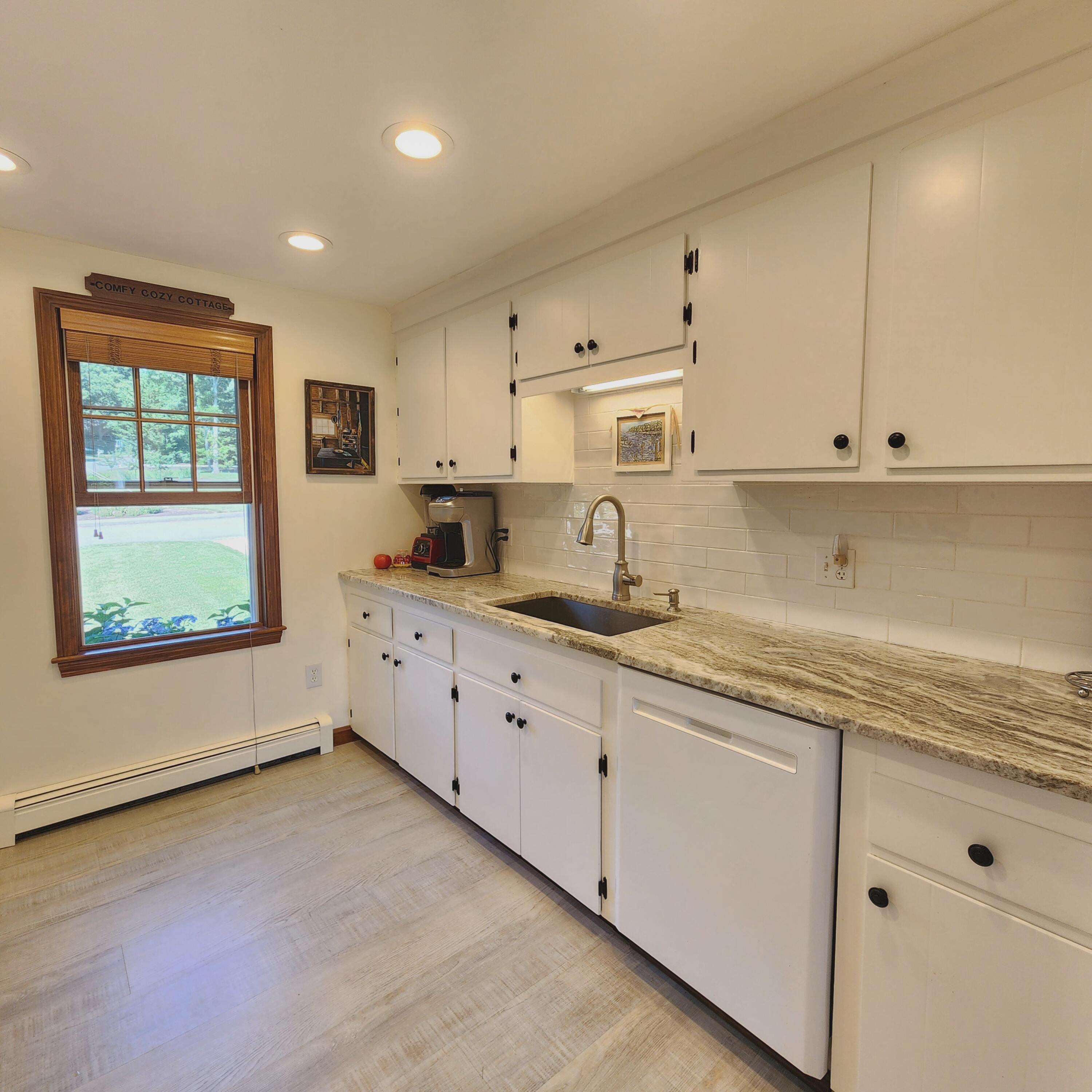 143 Abbey Gate Road Cotuit, MA 02635 - Photo 33 of 51 Kitchen with quartz