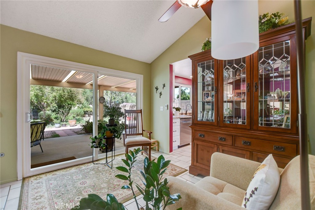 255 Mosport Street Hemet, CA 92544 - Photo 11 of 31 a living room filled with furniture and a large window
