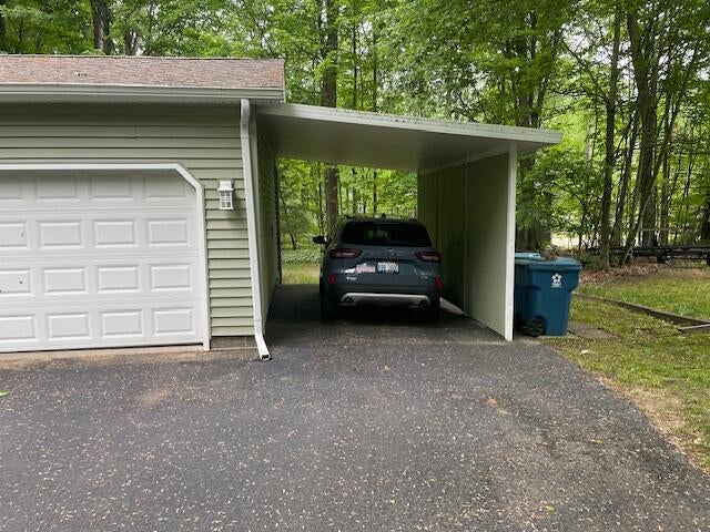 95 Caduca Drive Roscommon, MI 48653 - Photo 3 of 14 Carport