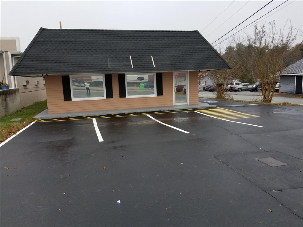 766 Collins Road Toccoa, GA 30577 - Photo 1 of 1 a front view of a house with a ocean view