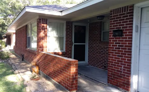 a view of backyard of house