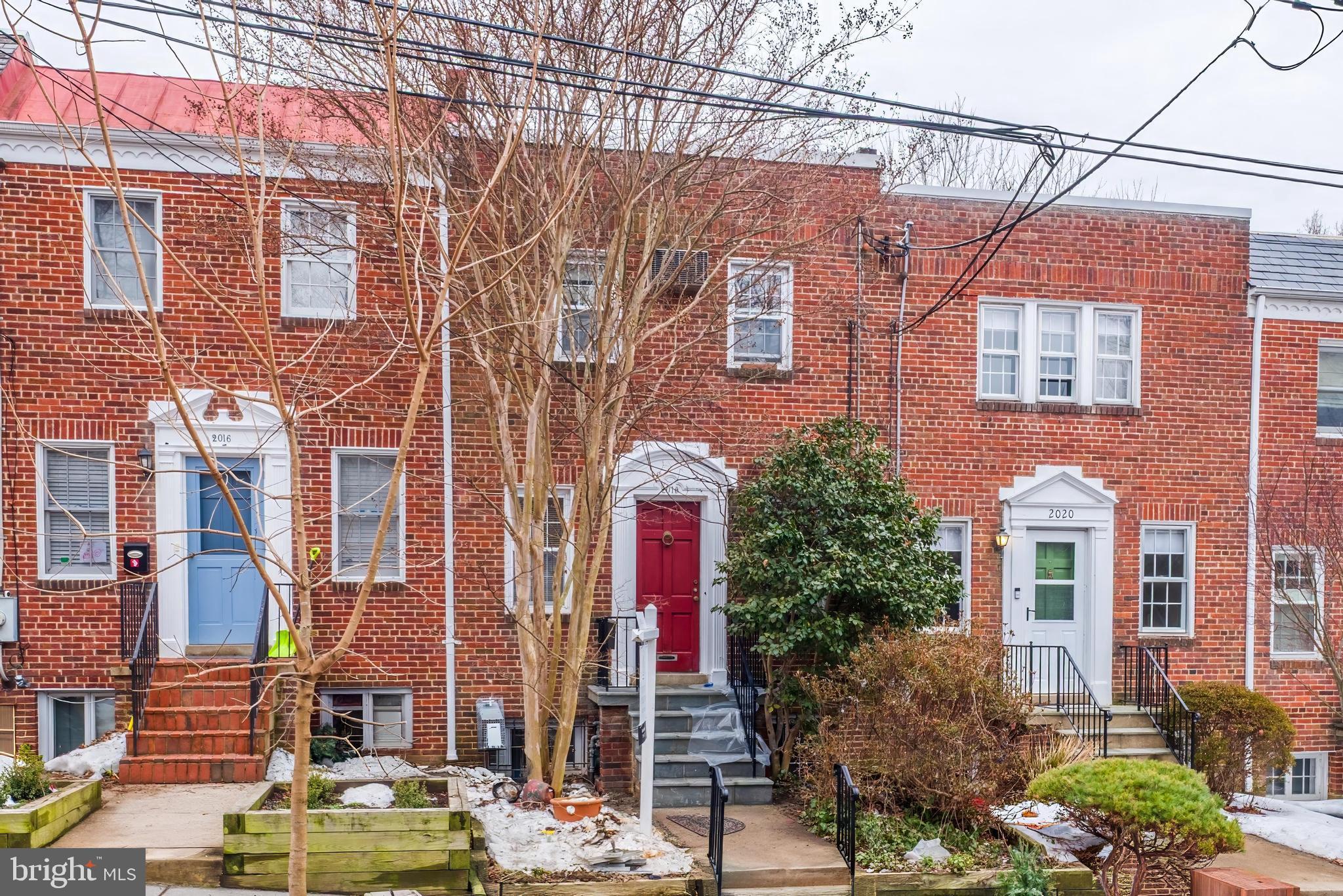2018 Tunlaw Road Northwest Washington, DC 20007 - Photo 2 of 17 a front view of a building