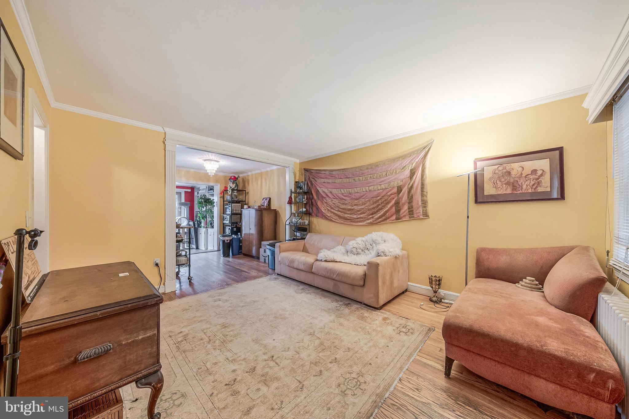 2018 Tunlaw Road Northwest Washington, DC 20007 - Photo 3 of 17 a living room with furniture and a couch