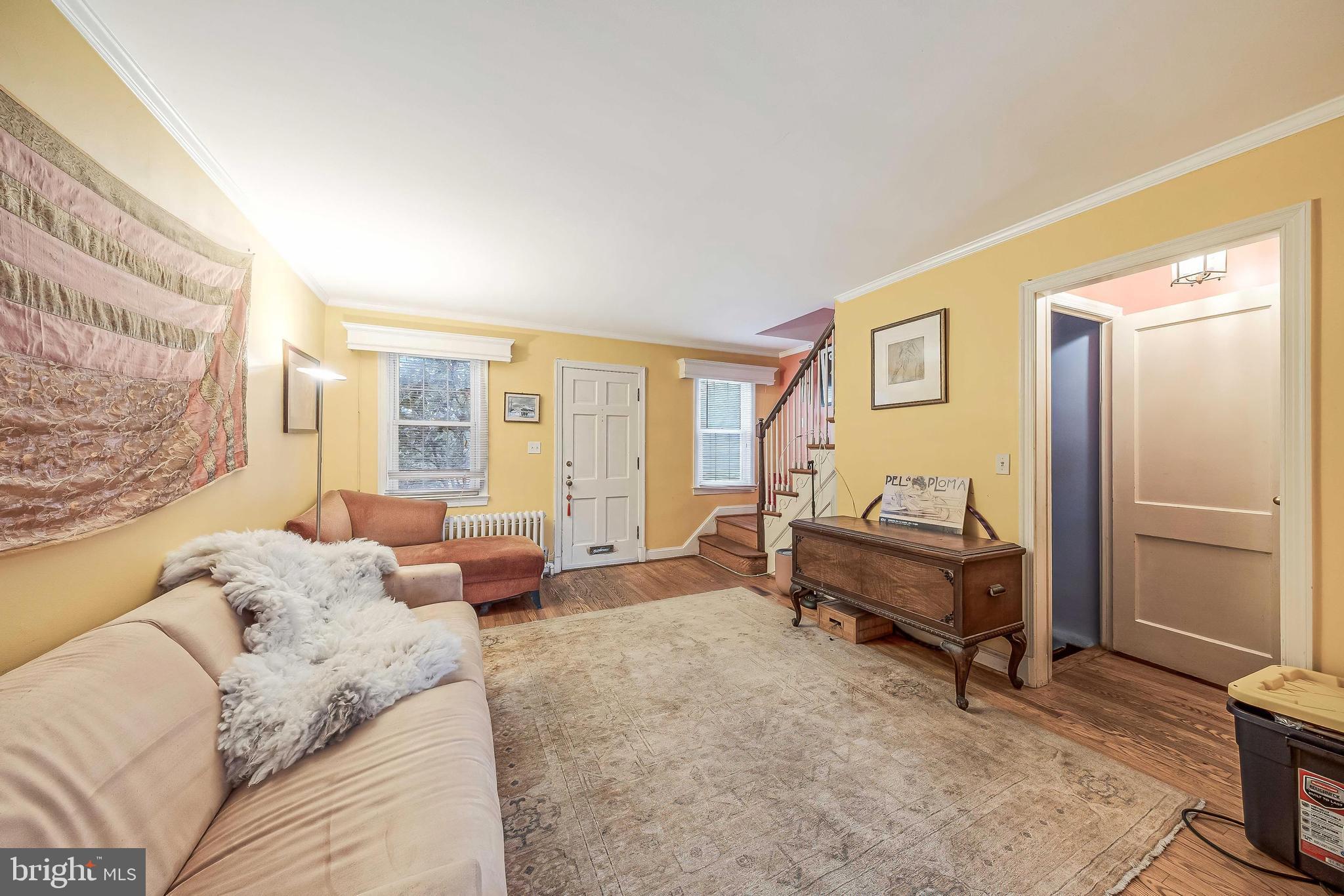 2018 Tunlaw Road Northwest Washington, DC 20007 - Photo 4 of 17 a bedroom with furniture and a window