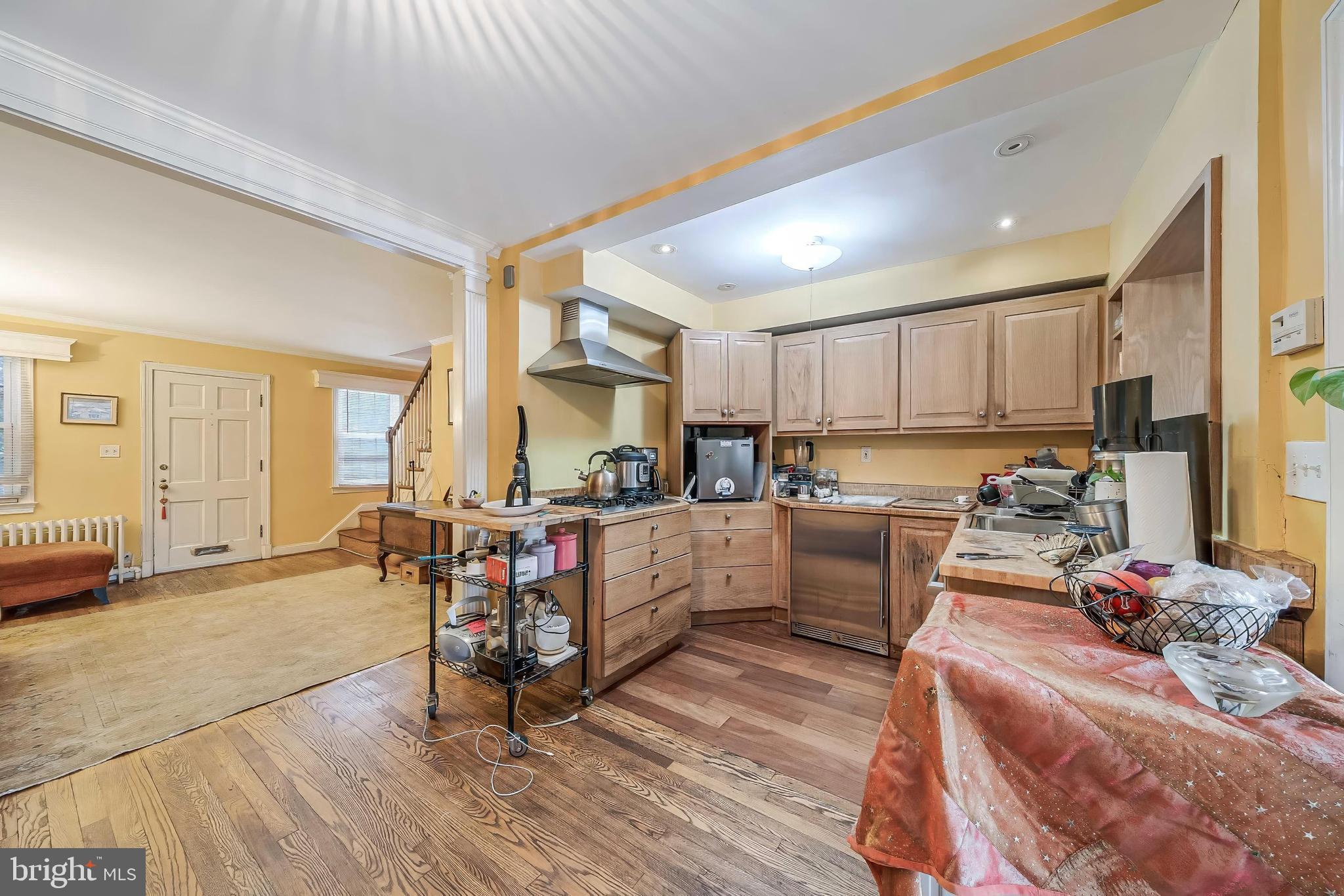 2018 Tunlaw Road Northwest Washington, DC 20007 - Photo 6 of 17 a kitchen with a refrigerator and a stove top oven