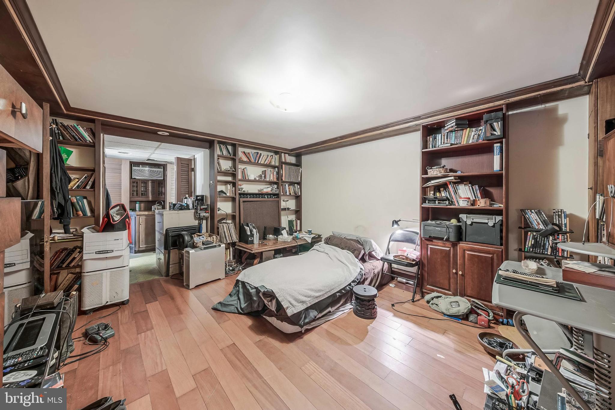 2018 Tunlaw Road Northwest Washington, DC 20007 - Photo 8 of 17 a living room with furniture and a wooden floor