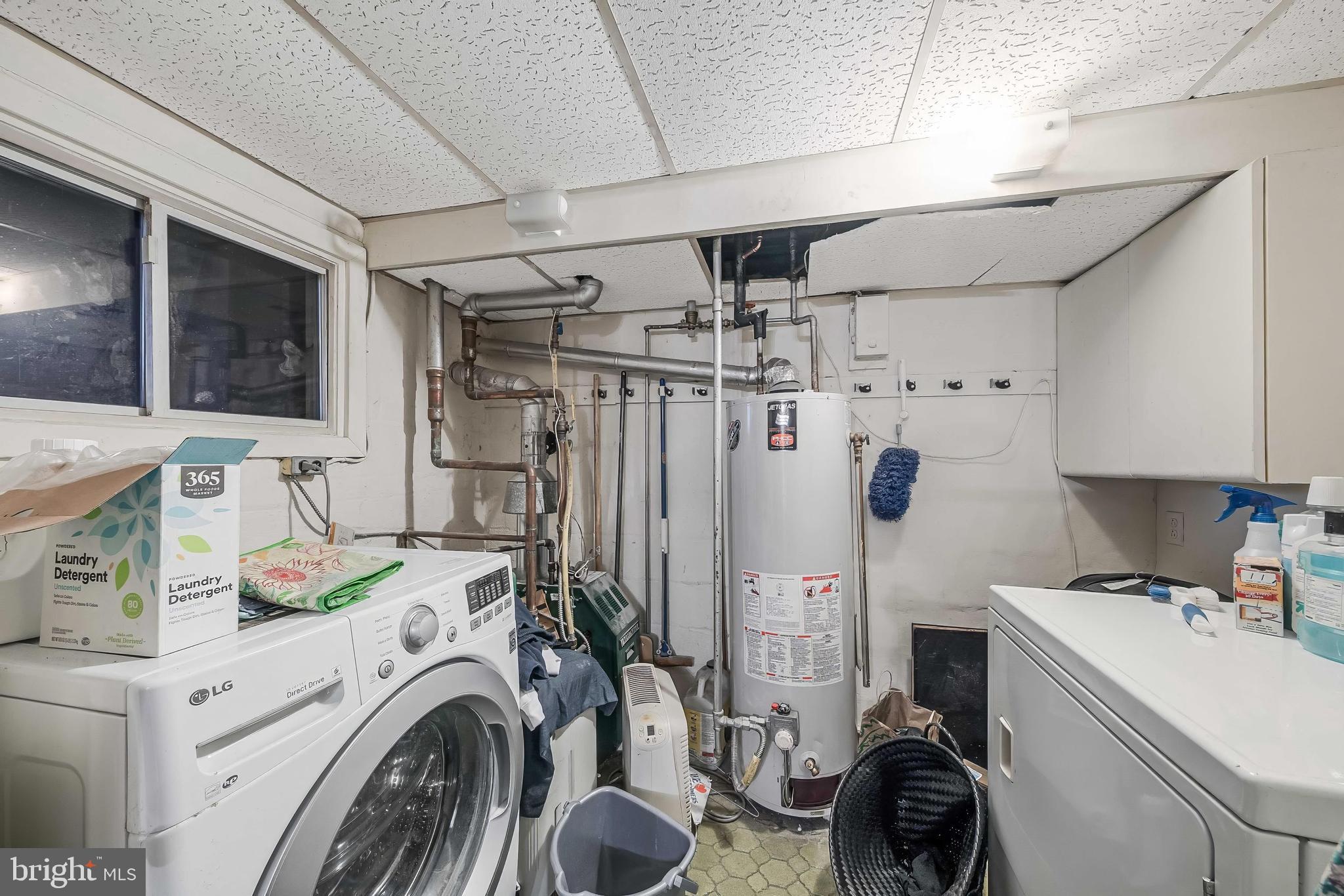 2018 Tunlaw Road Northwest Washington, DC 20007 - Photo 9 of 17 a view of storage and utility room with washer and dryer