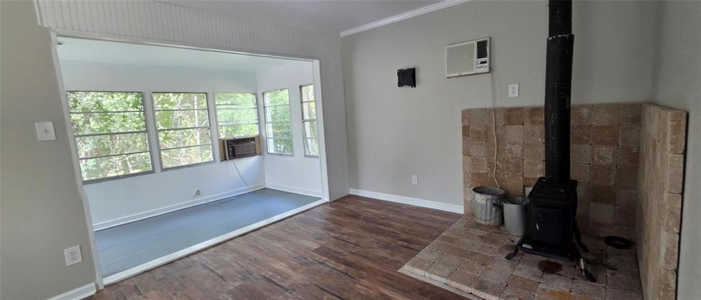 333 Canal Street Ringgold, LA 71068 - Photo 8 of 33 wooden floor in an empty room with a window