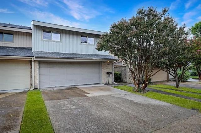 a view of a house with a window and door