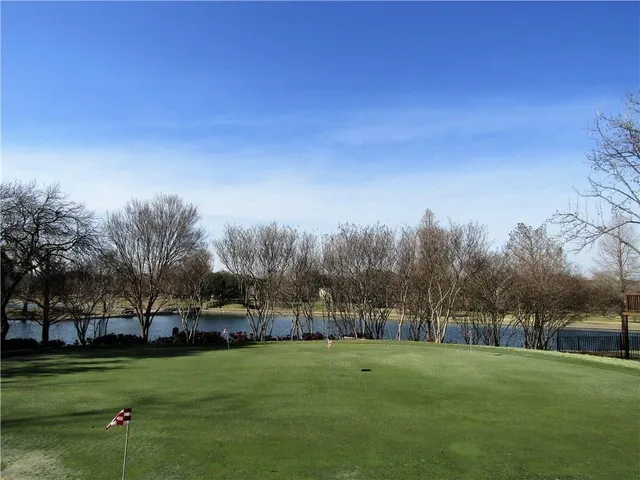 a view of a park with tree s