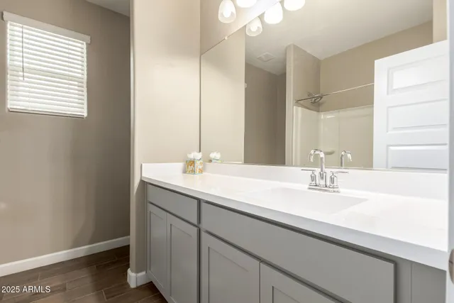 a bathroom with a bathtub and shower