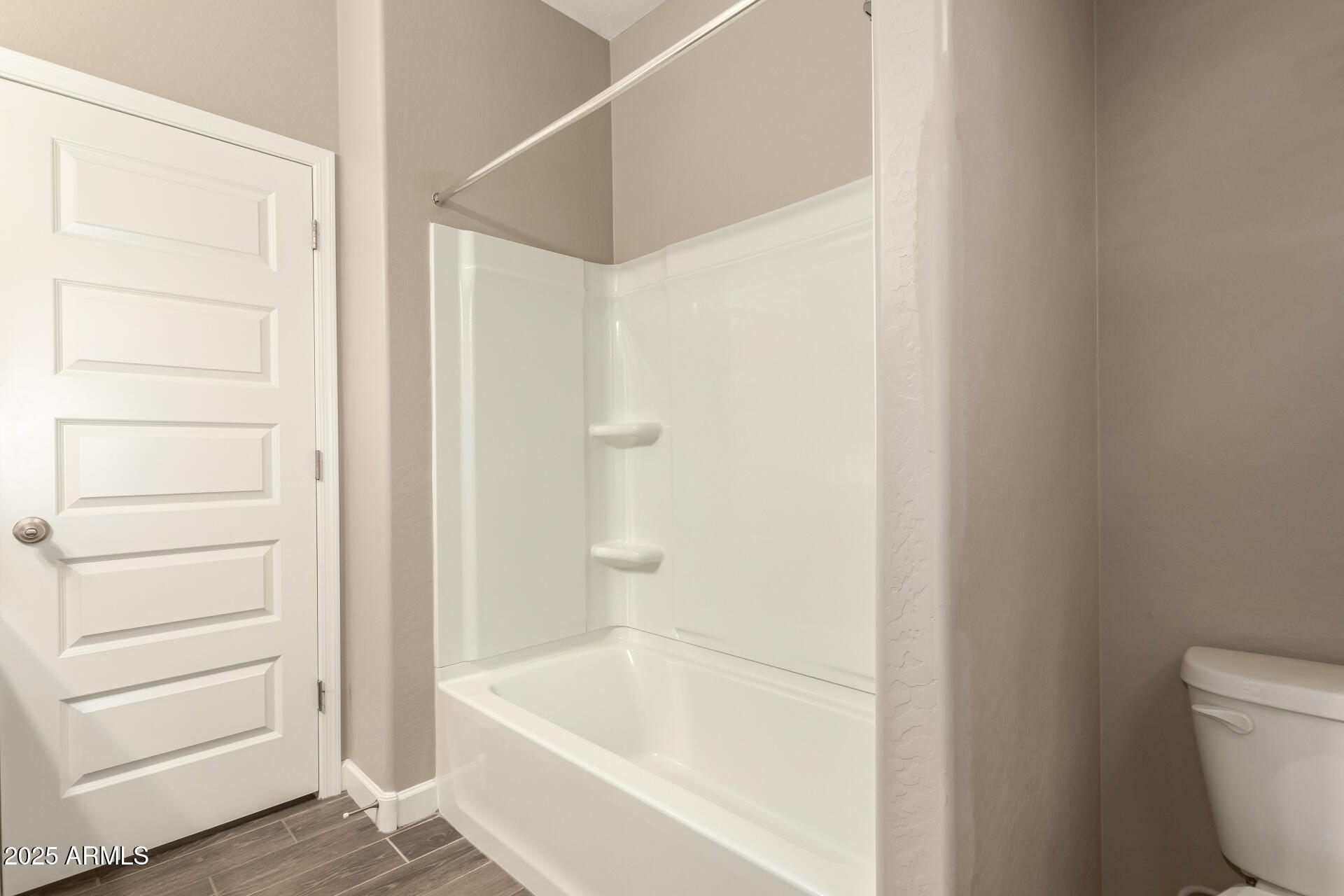 1357 East Chillingham Road San Tan Valley, AZ 85143 - Photo 26 of 32 a bathroom with a bathtub and shower
