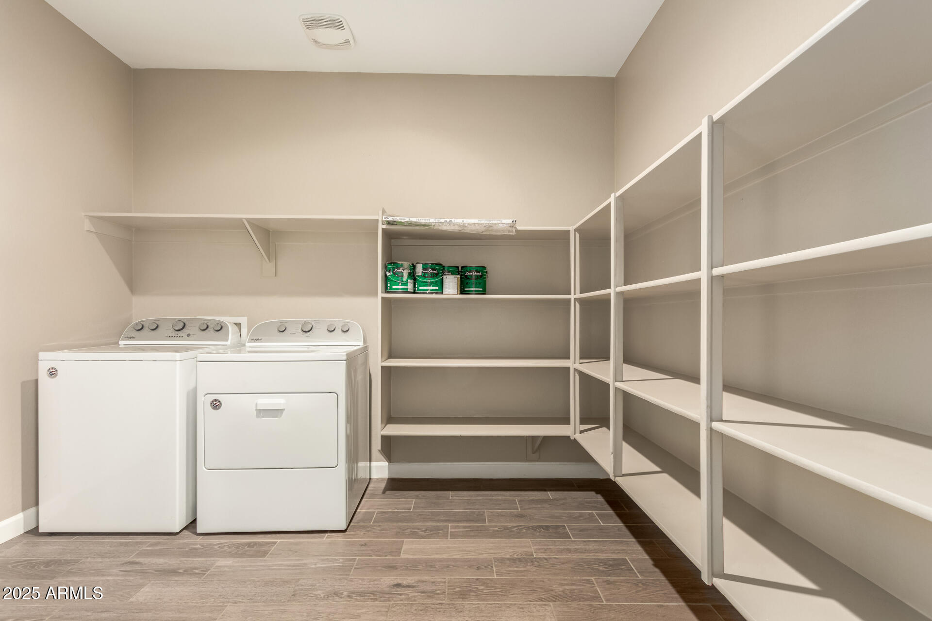 1357 East Chillingham Road San Tan Valley, AZ 85143 - Photo 27 of 32 a view of storage and utility room with washer and dryer
