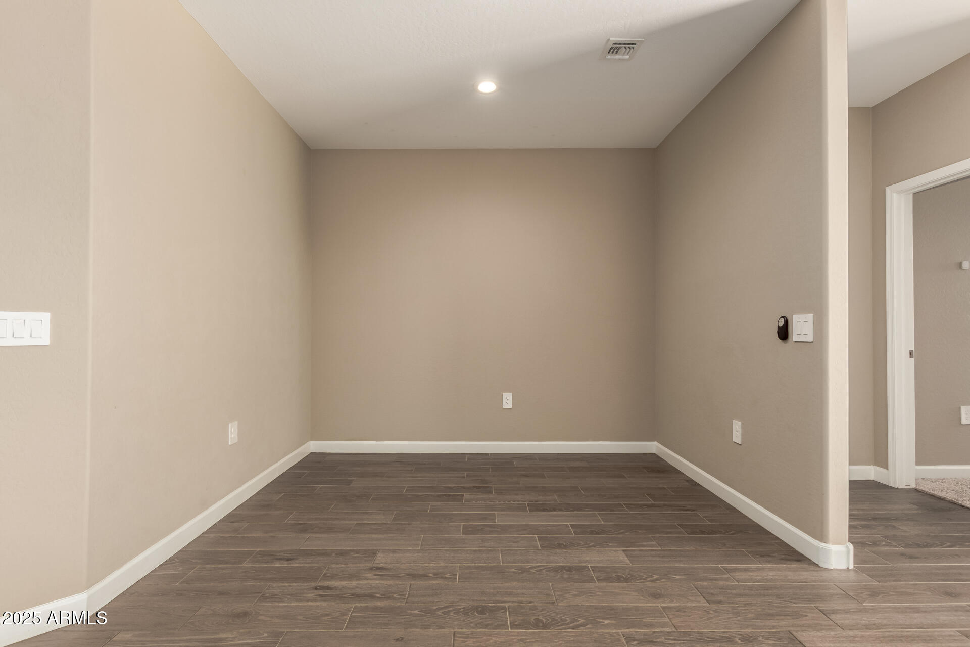 1357 East Chillingham Road San Tan Valley, AZ 85143 - Photo 8 of 32 a view of room with wooden floor