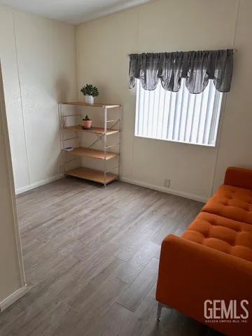 a room with bed and a window