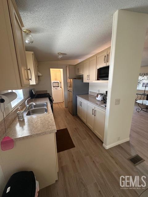 Undisclosed Address Tehachapi, CA 93561 - Photo 8 of 13 a kitchen with sink refrigerator and stove