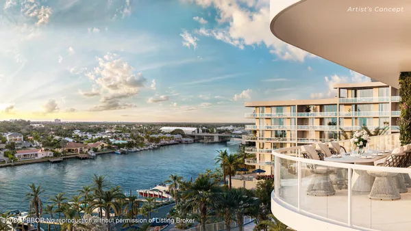 an aerial view of a swimming pool and lake view