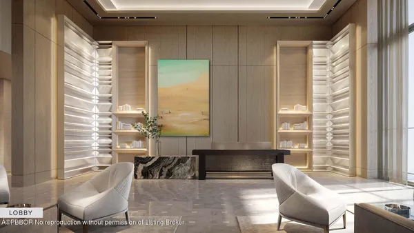 a living room with furniture and floor to ceiling windows