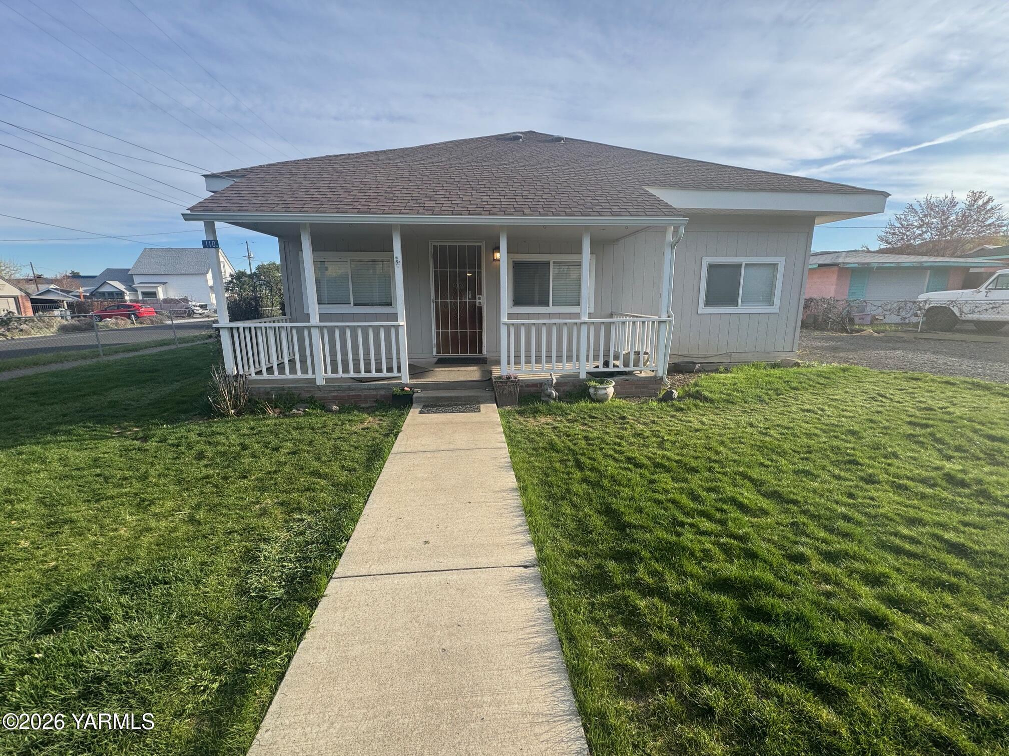 110 East Second Street Naches, WA 98937 - Photo 1 of 17 a front view of a house with a yard