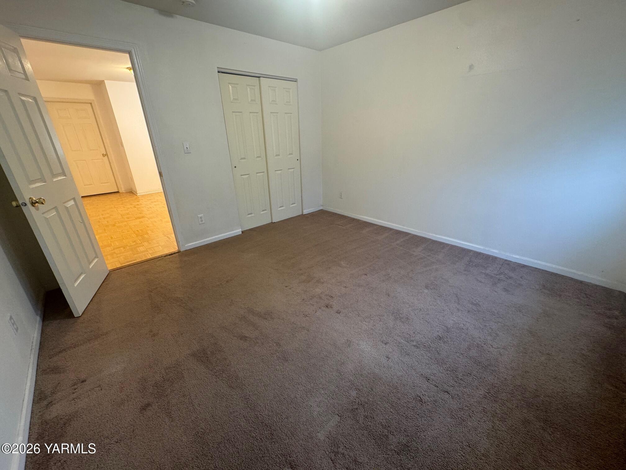 110 East Second Street Naches, WA 98937 - Photo 11 of 17 a view of an empty room and a window