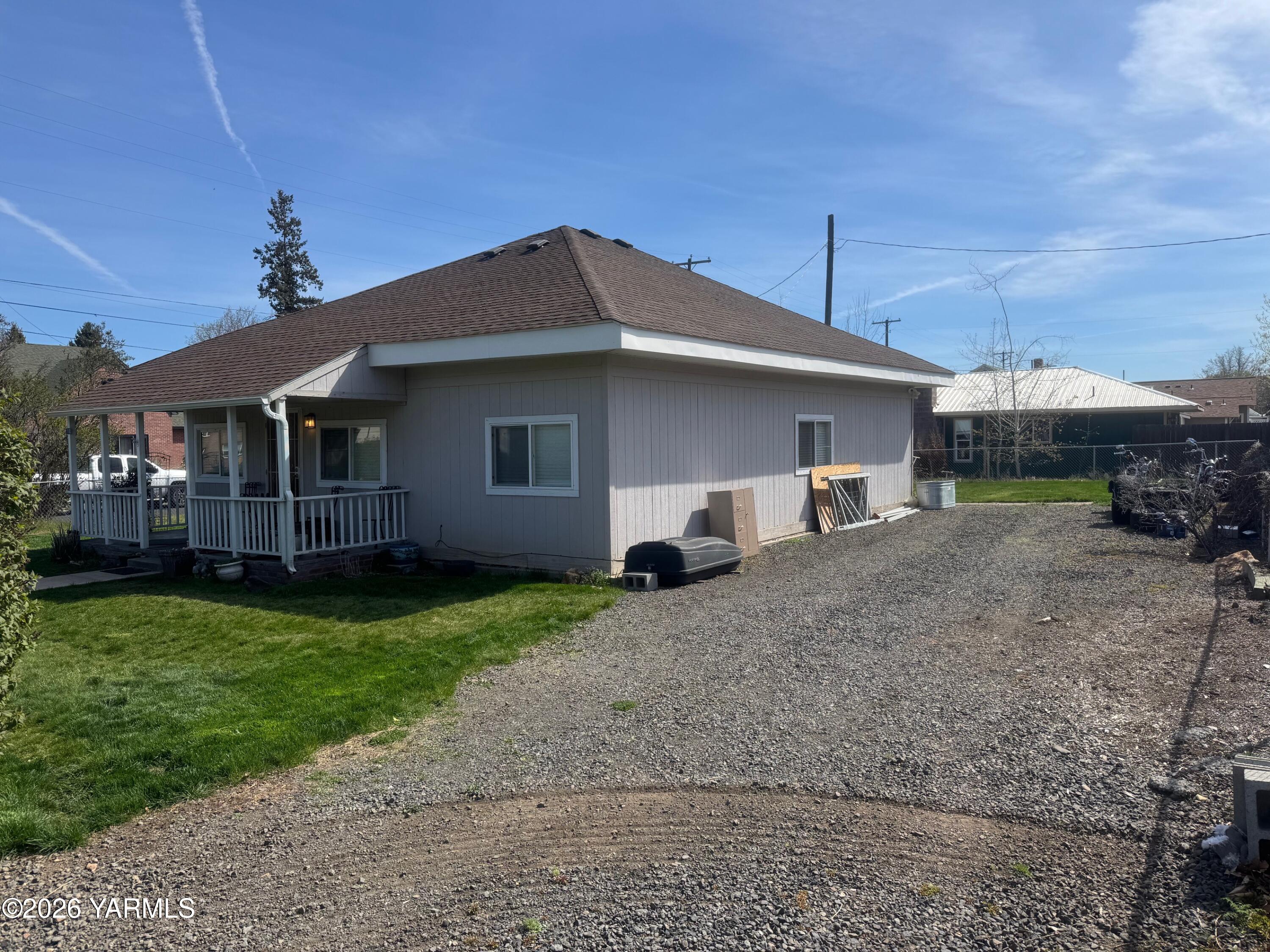 110 East Second Street Naches, WA 98937 - Photo 3 of 17 a front view of a house with garden
