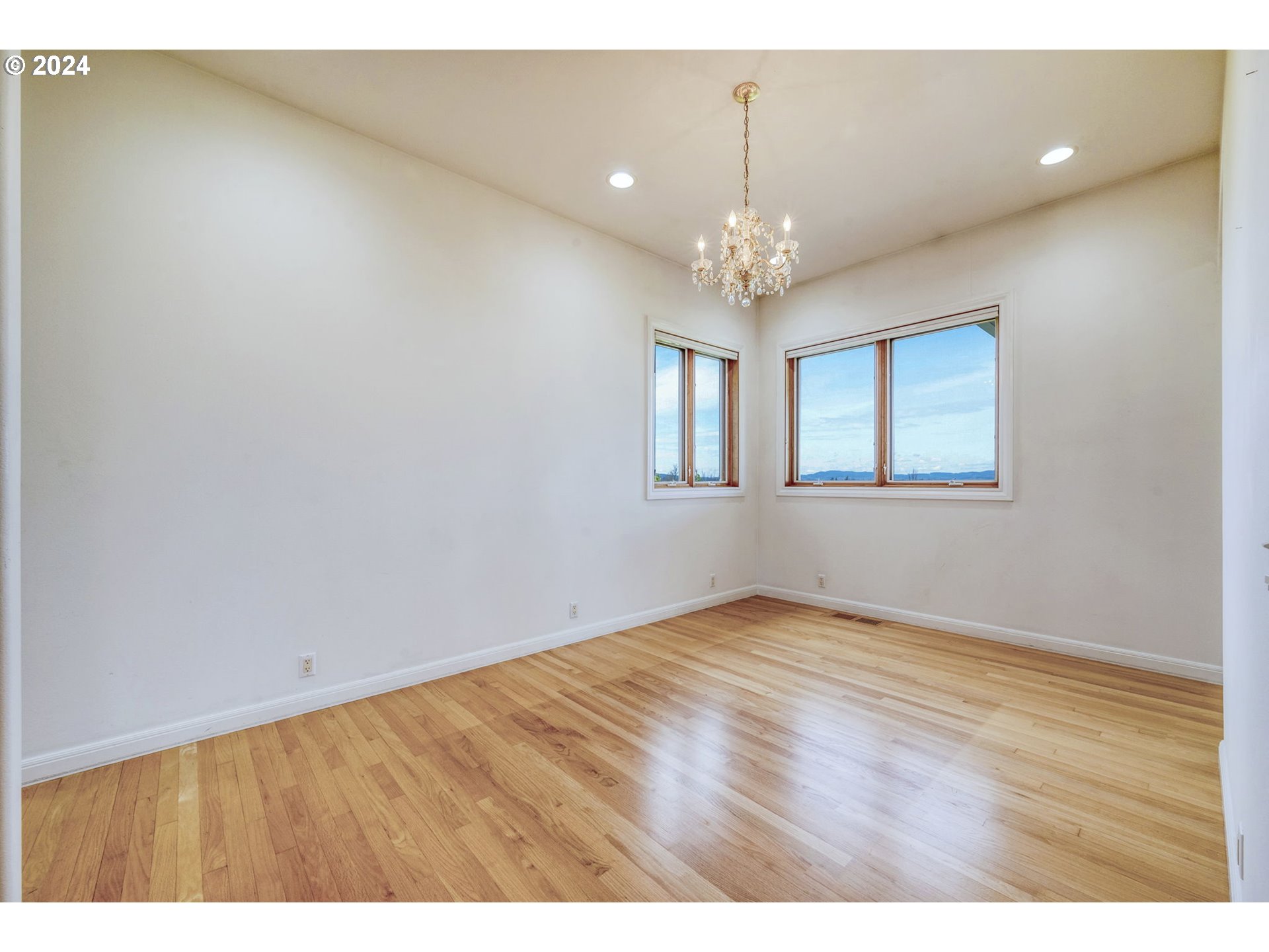35741 Spring Hill Road Creswell, OR 97426 - Photo 17 of 47 wooden floor in an empty room with a window