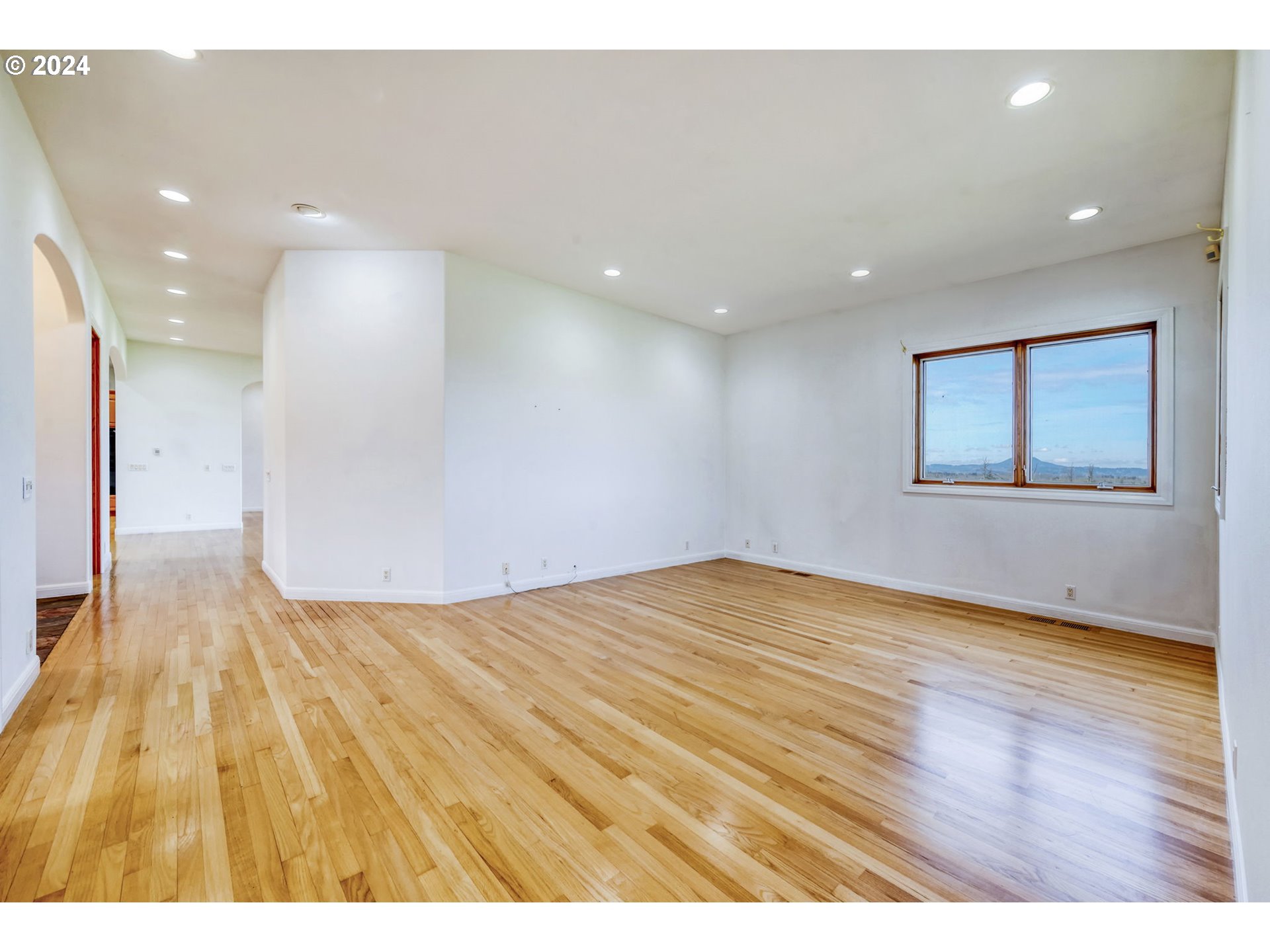35741 Spring Hill Road Creswell, OR 97426 - Photo 20 of 47 a view of an empty room with wooden floor
