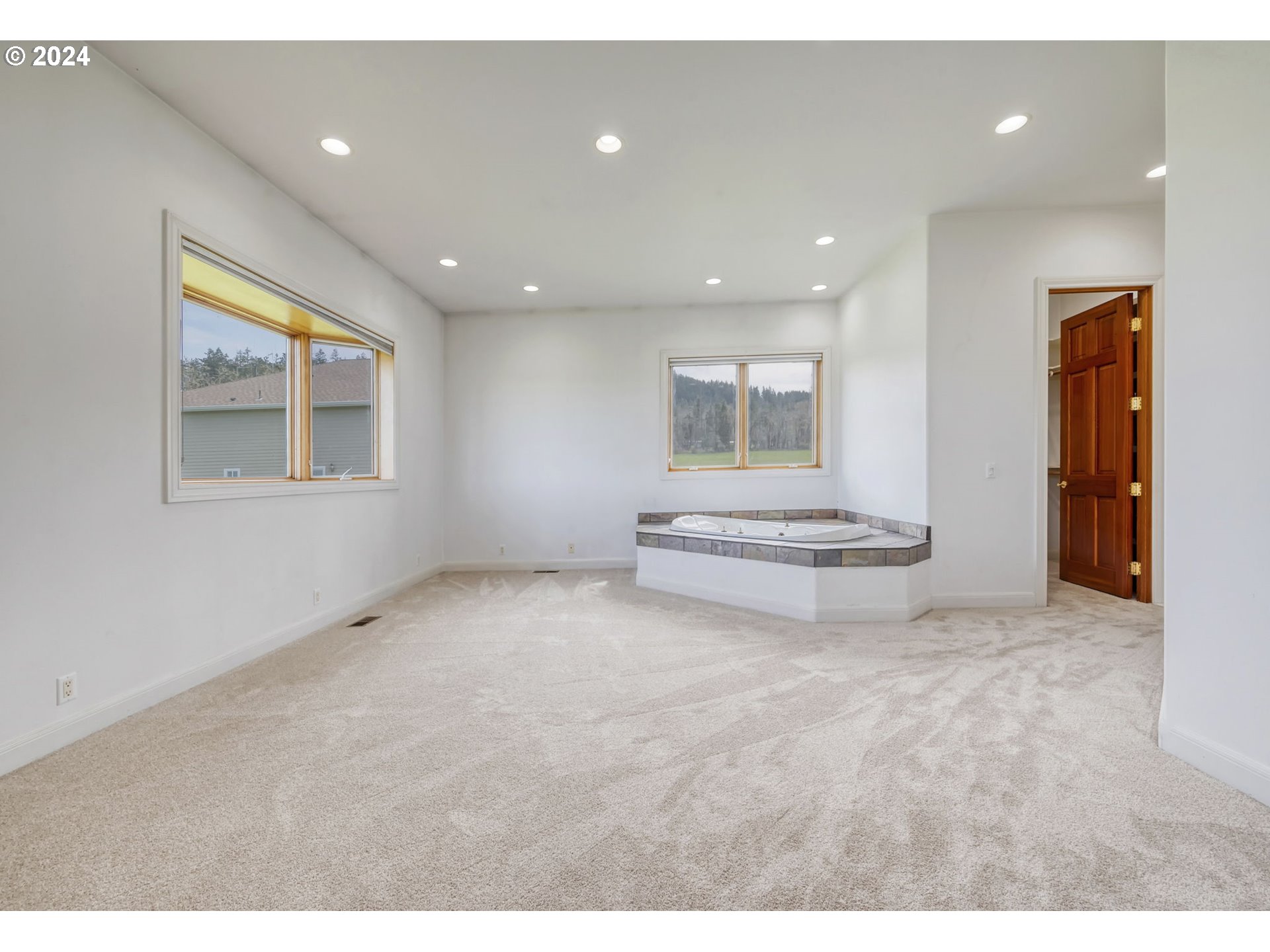 35741 Spring Hill Road Creswell, OR 97426 - Photo 24 of 47 a view of a room with a furniture and a ceiling fan
