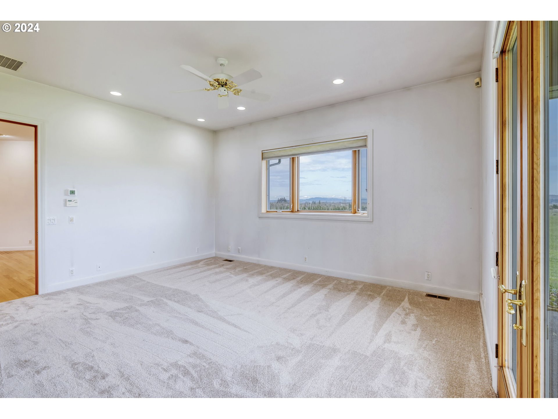 35741 Spring Hill Road Creswell, OR 97426 - Photo 25 of 47 a view of an empty room with a window