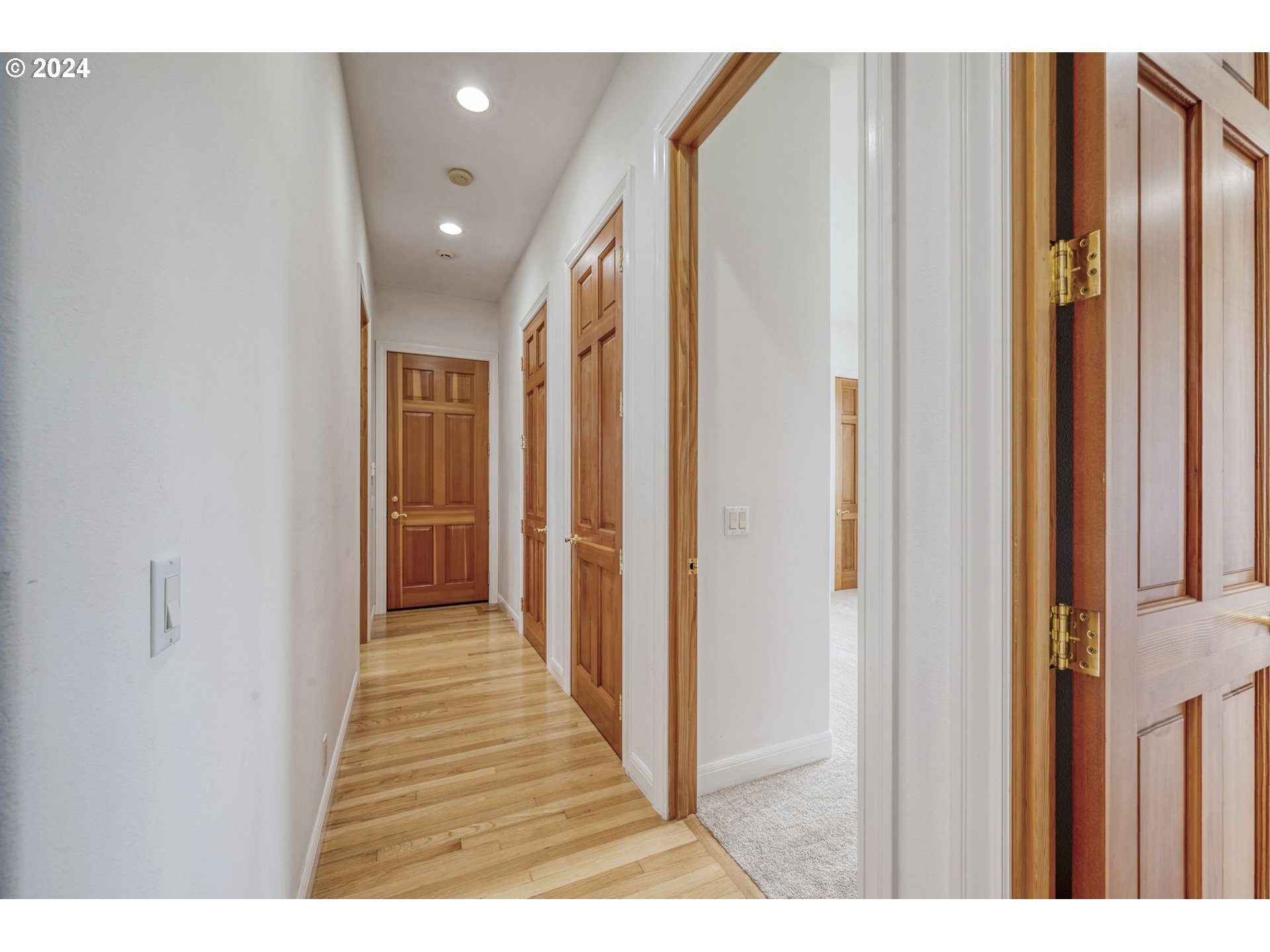 35741 Spring Hill Road Creswell, OR 97426 - Photo 33 of 47 a view of a hallway with wooden floor