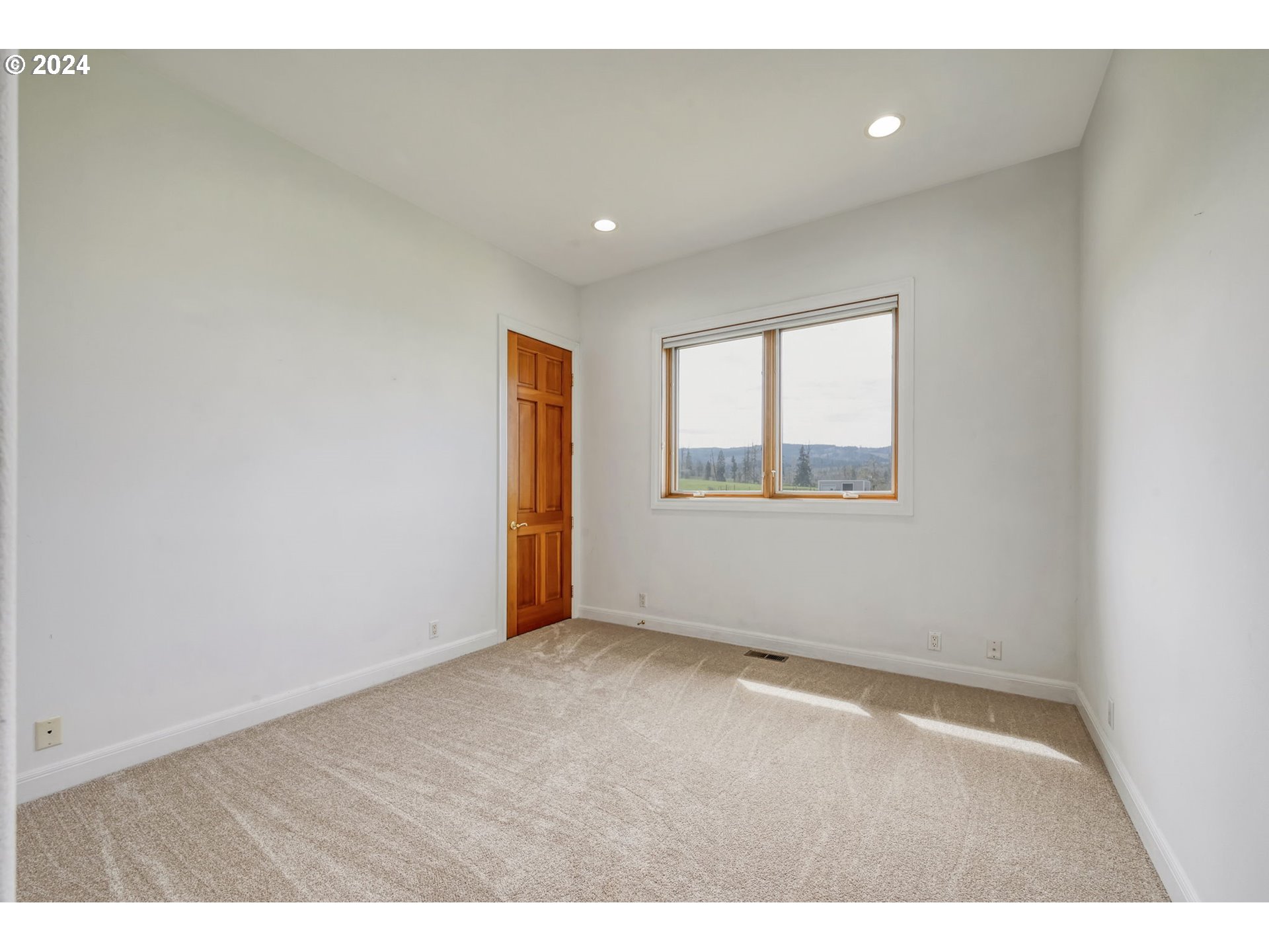 35741 Spring Hill Road Creswell, OR 97426 - Photo 35 of 47 a view of an empty room with a window