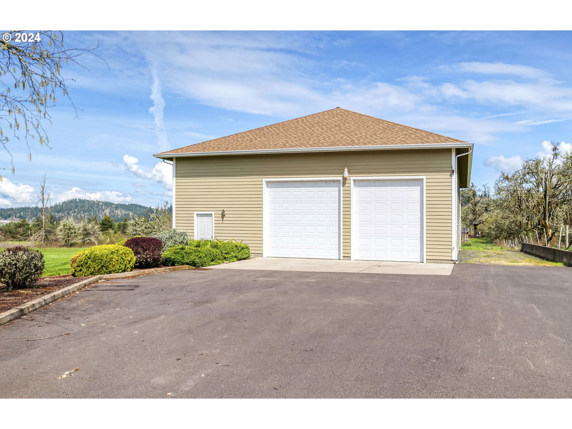35741 Spring Hill Road Creswell, OR 97426 - Photo 42 of 47 a view of a house with a yard