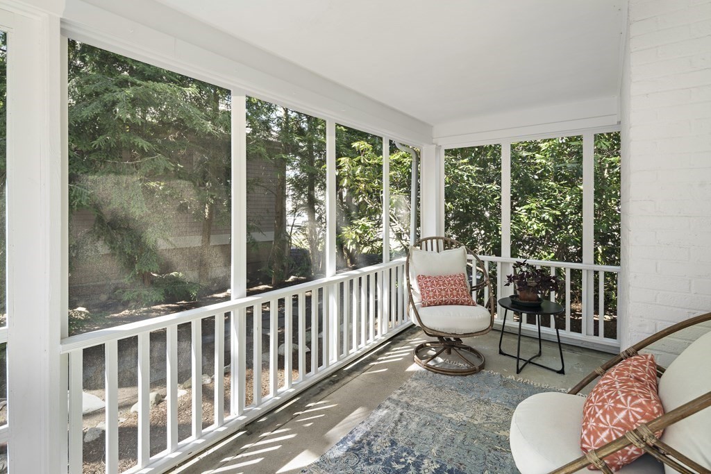 228 Islington Road Newton, MA 02466 - Photo 14 of 29 a view of a room with furniture and floor to ceiling window