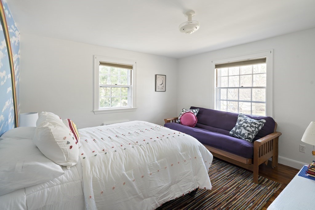 228 Islington Road Newton, MA 02466 - Photo 18 of 29 a bedroom with a bed and a couch