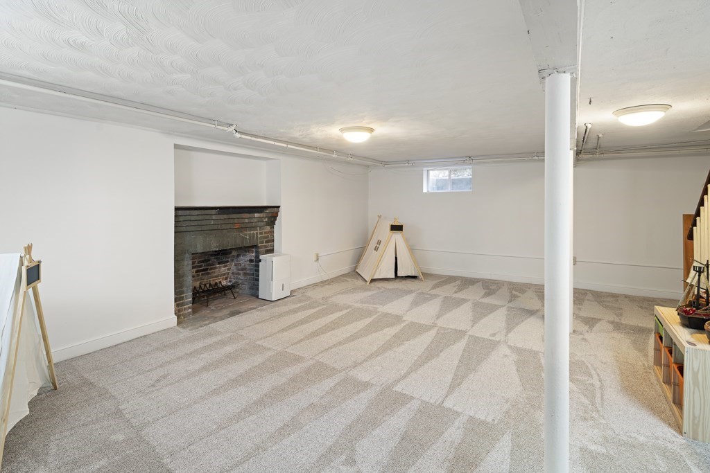 228 Islington Road Newton, MA 02466 - Photo 23 of 29 a view of a livingroom with a fireplace