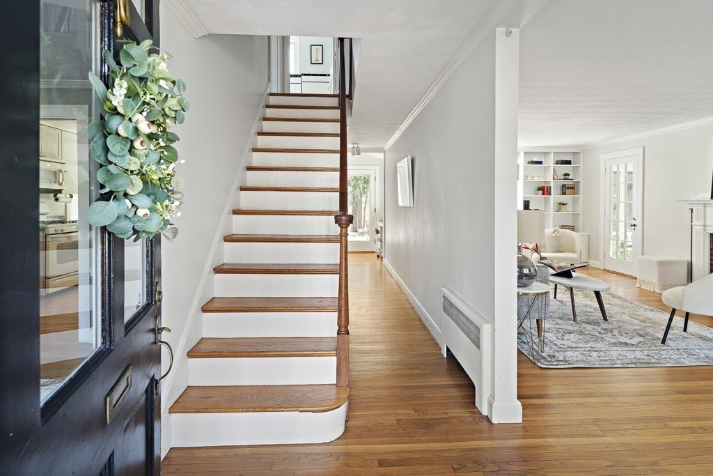228 Islington Road Newton, MA 02466 - Photo 6 of 29 a view of entryway and hall with wooden floor