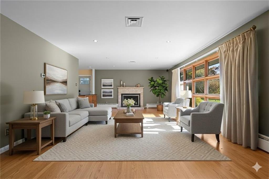 208 Summit Road Butler, PA 16001 - Photo 3 of 33 a living room with furniture and a fireplace